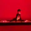A young boy benefiting from the advanced red light therapy panel by sitting on a REDi Photon mat., red light therapy