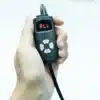 A person utilizing a REDi Infuse Plus device for red light therapy immersion in their car., red light therapy