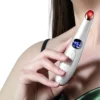 A woman is holding a REDi Retouch with a red light on it.