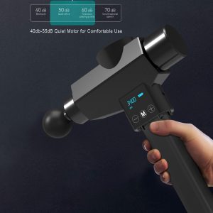 A person is holding a Healthspan Lab Beast massage gun.